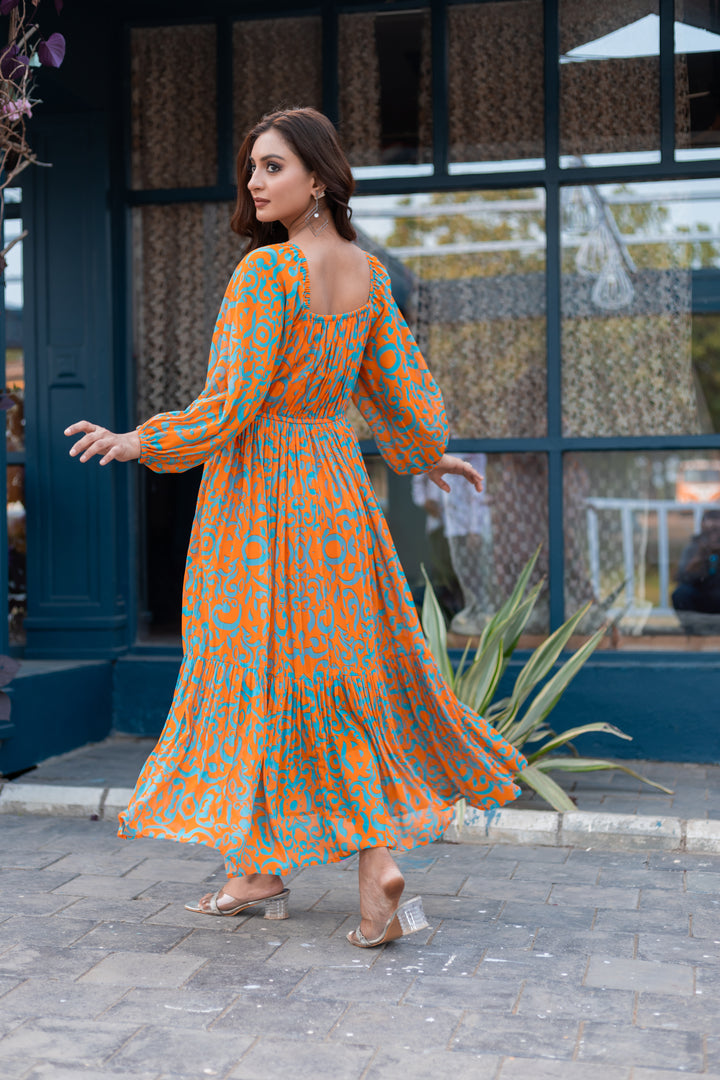 Back view of orange and cyan blue floral maxi dress with U-neckline and full sleeves