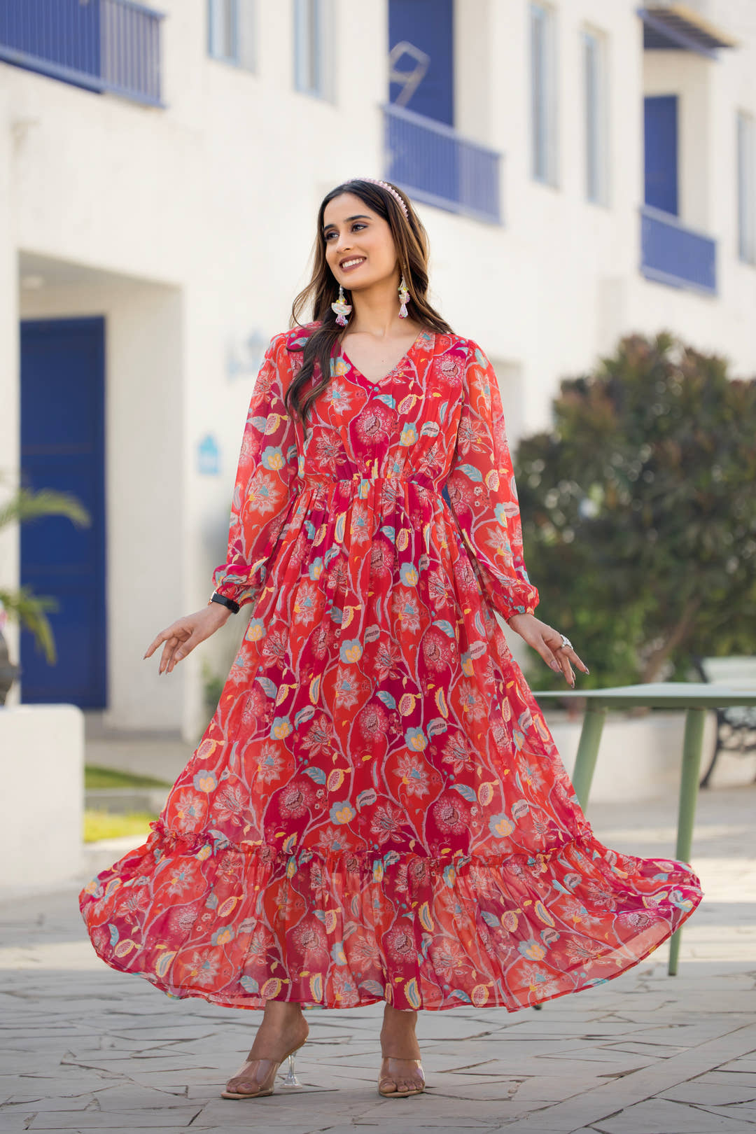 Model wearing Ruby Romance red floral maxi dress by Masakali
