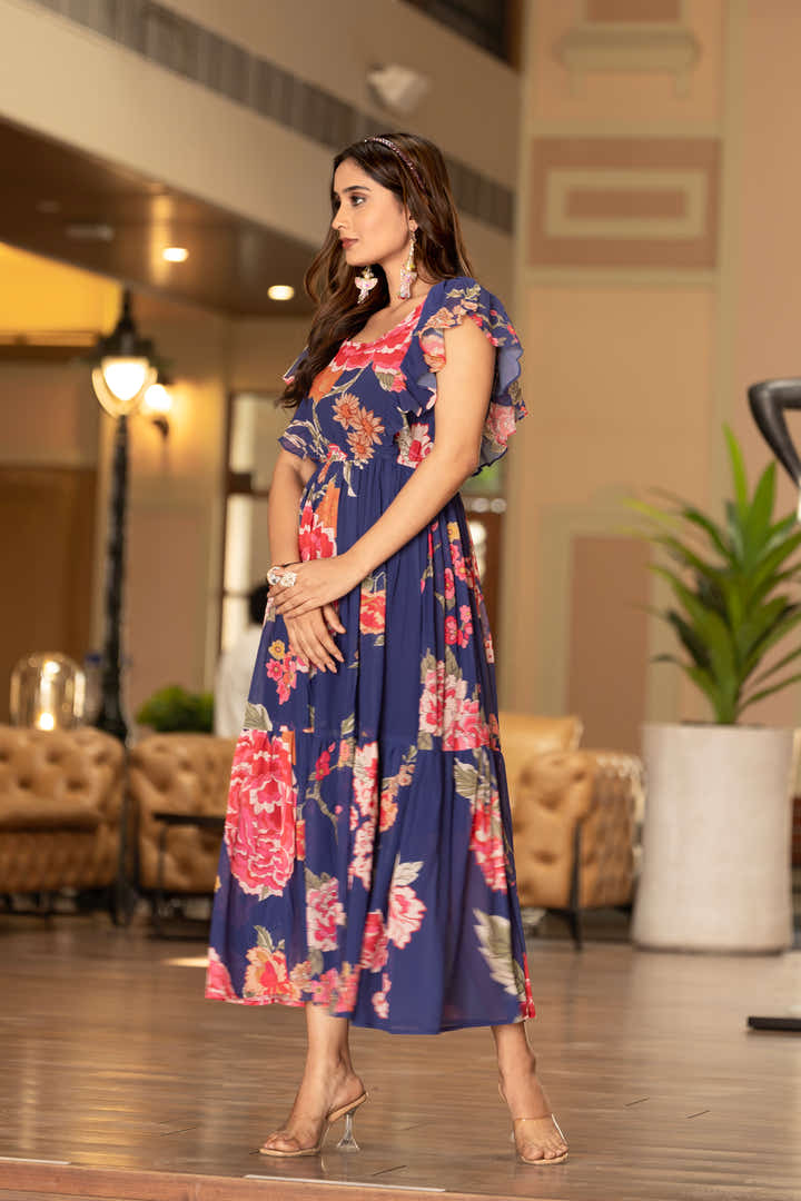 Side view of Masakali Garden Glam maxi dress with puff sleeves and floral print
