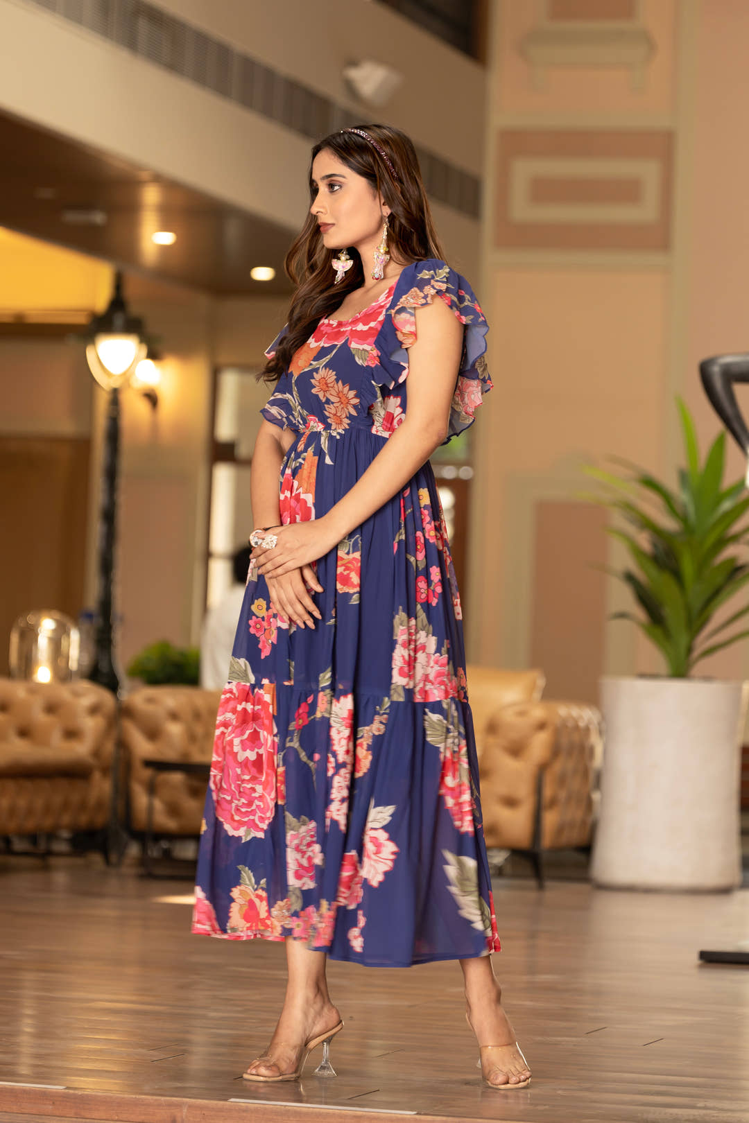 Side view of Masakali Garden Glam maxi dress with puff sleeves and floral print

