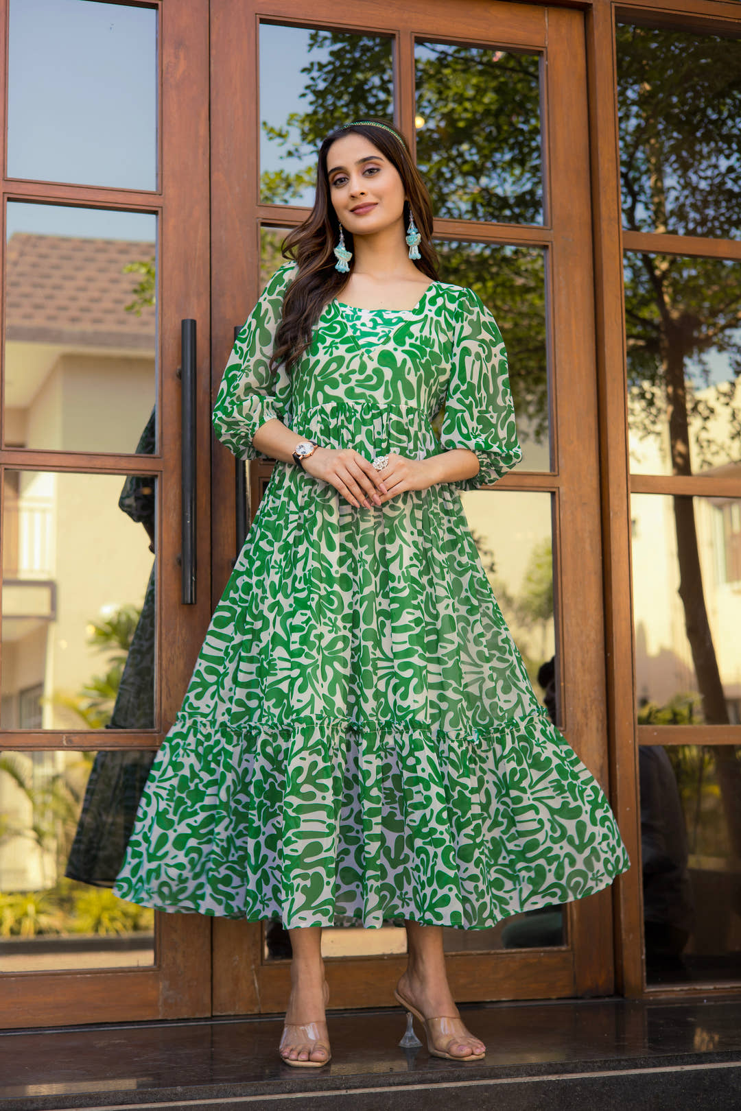 Model wearing Summer Sprite green floral maxi dress by Masakali