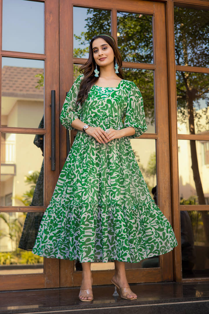 Model wearing Summer Sprite green floral maxi dress by Masakali