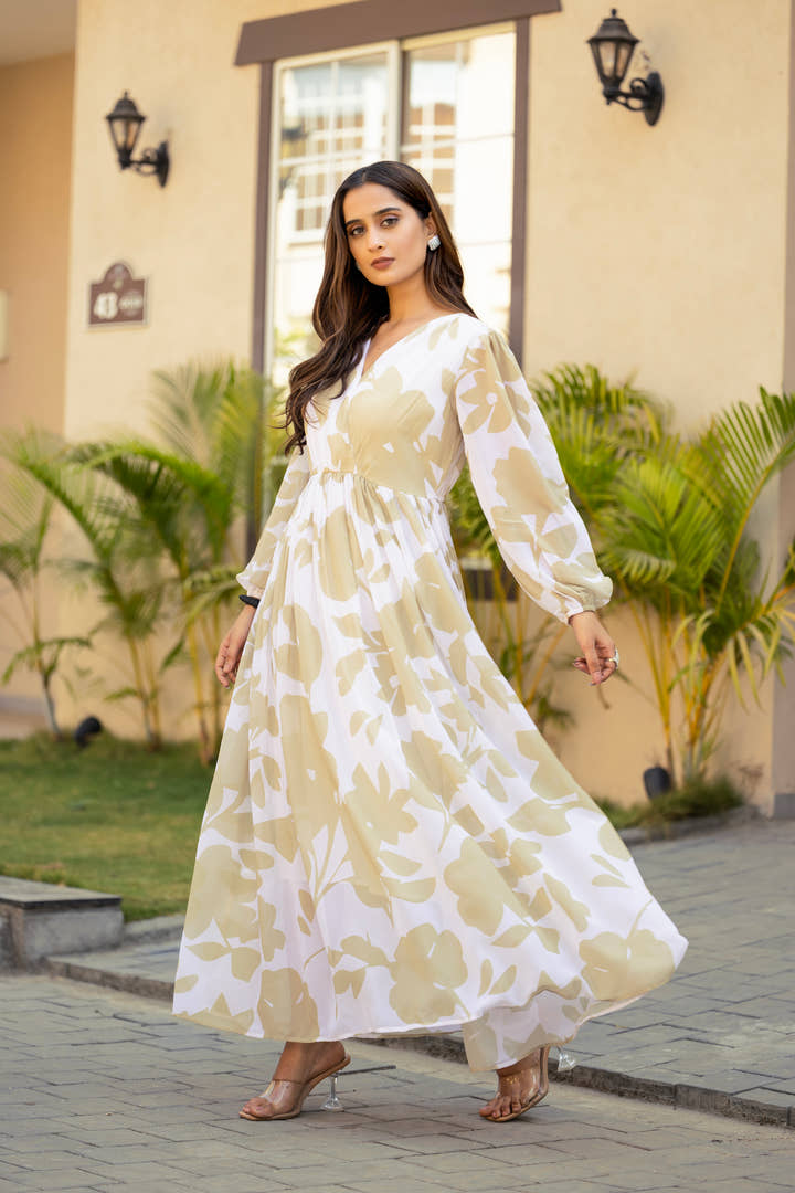 Model wearing Blush Dune Bloom petal green & cream floral maxi dress by Masakali
