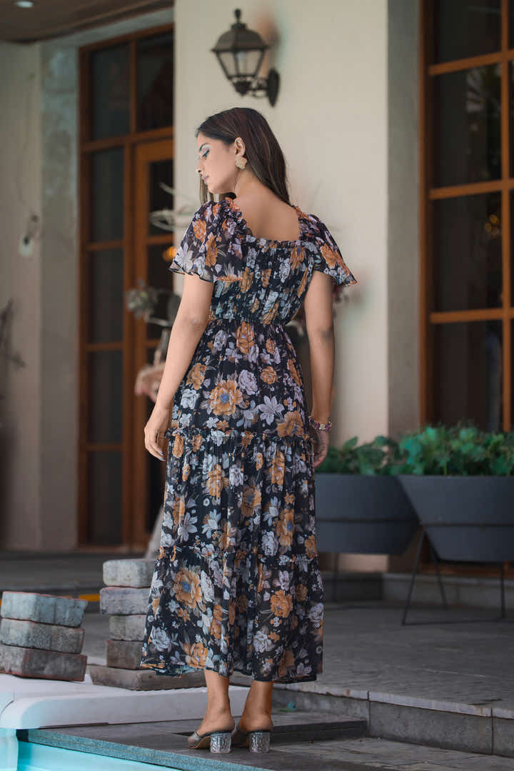 Back view of black midi dress with U-neckline and half sleeves