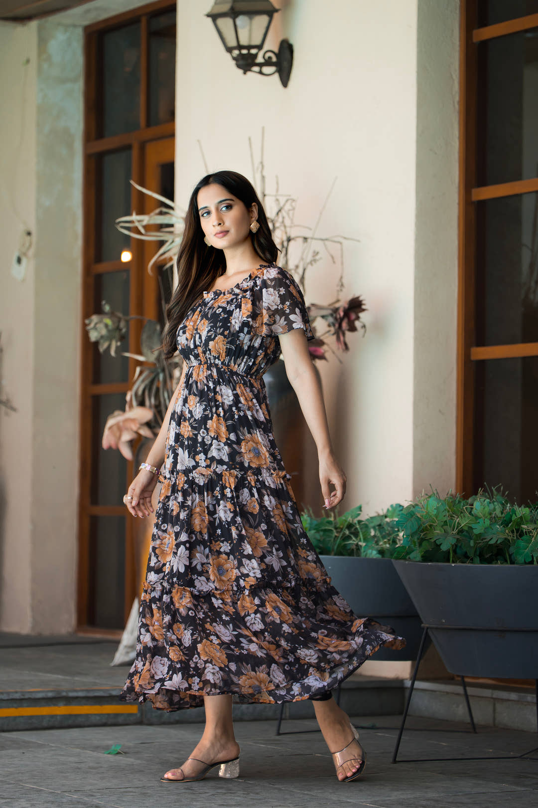 Side profile of Masakali's Relaxed Ruffle dress showcasing half-length sleeves