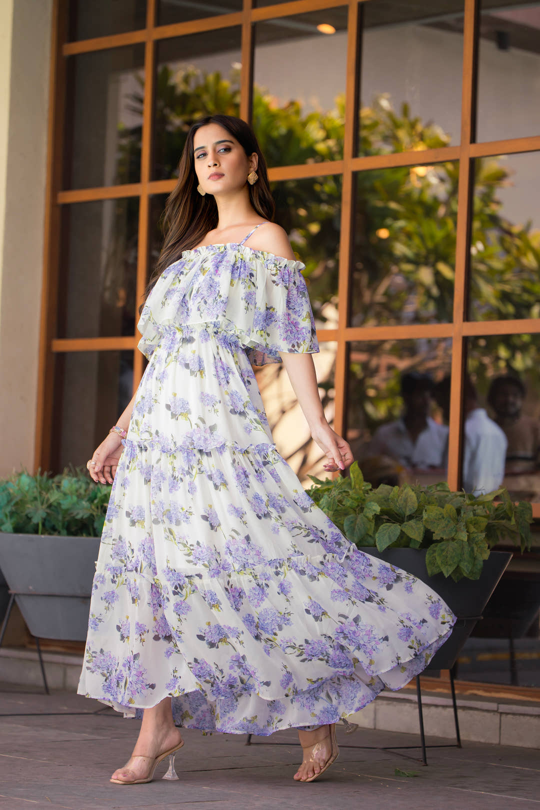 Model wearing Lavender Lilt off-shoulder floral dress by Masakali