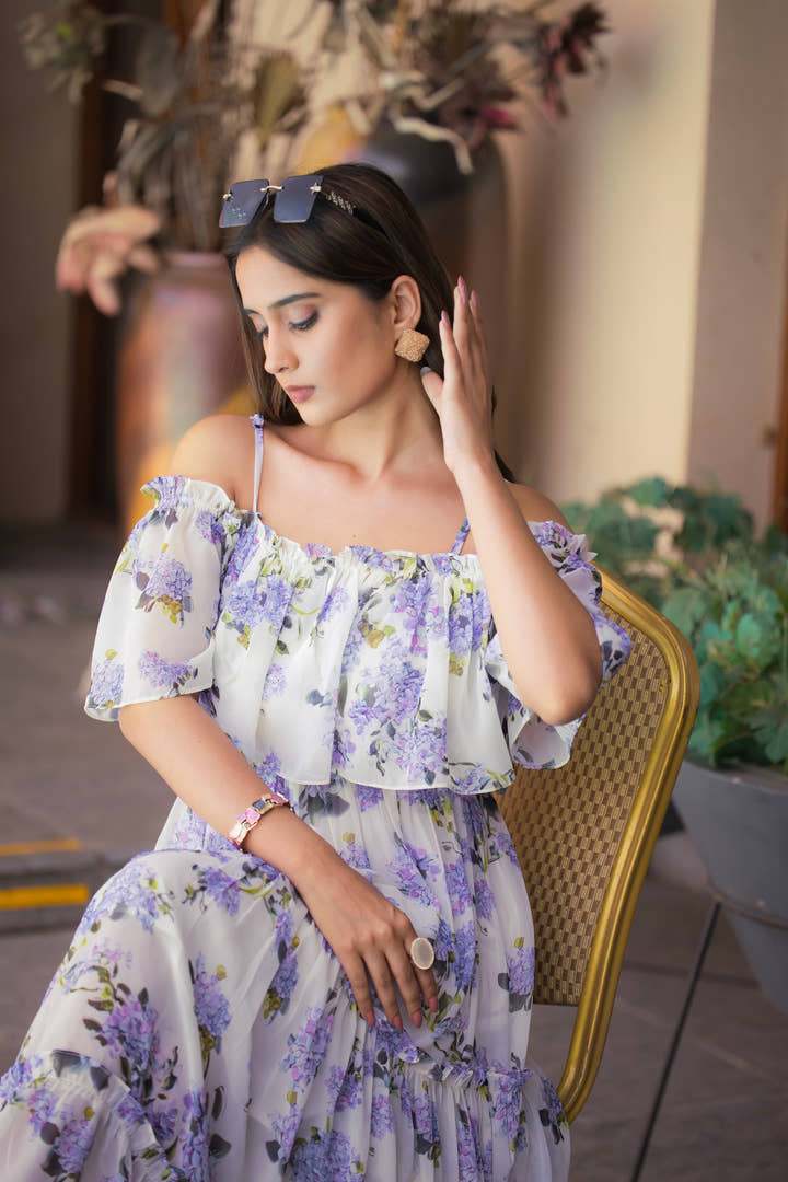 Close-up of off-shoulder neckline detail on soft fabric