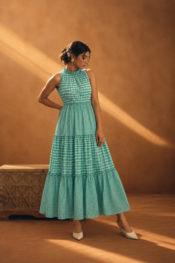 Aqua Gingham Maxi Dress full length front view showing aqua white gingham check seersucker 3-tier maxi with mock neck and smocked waist