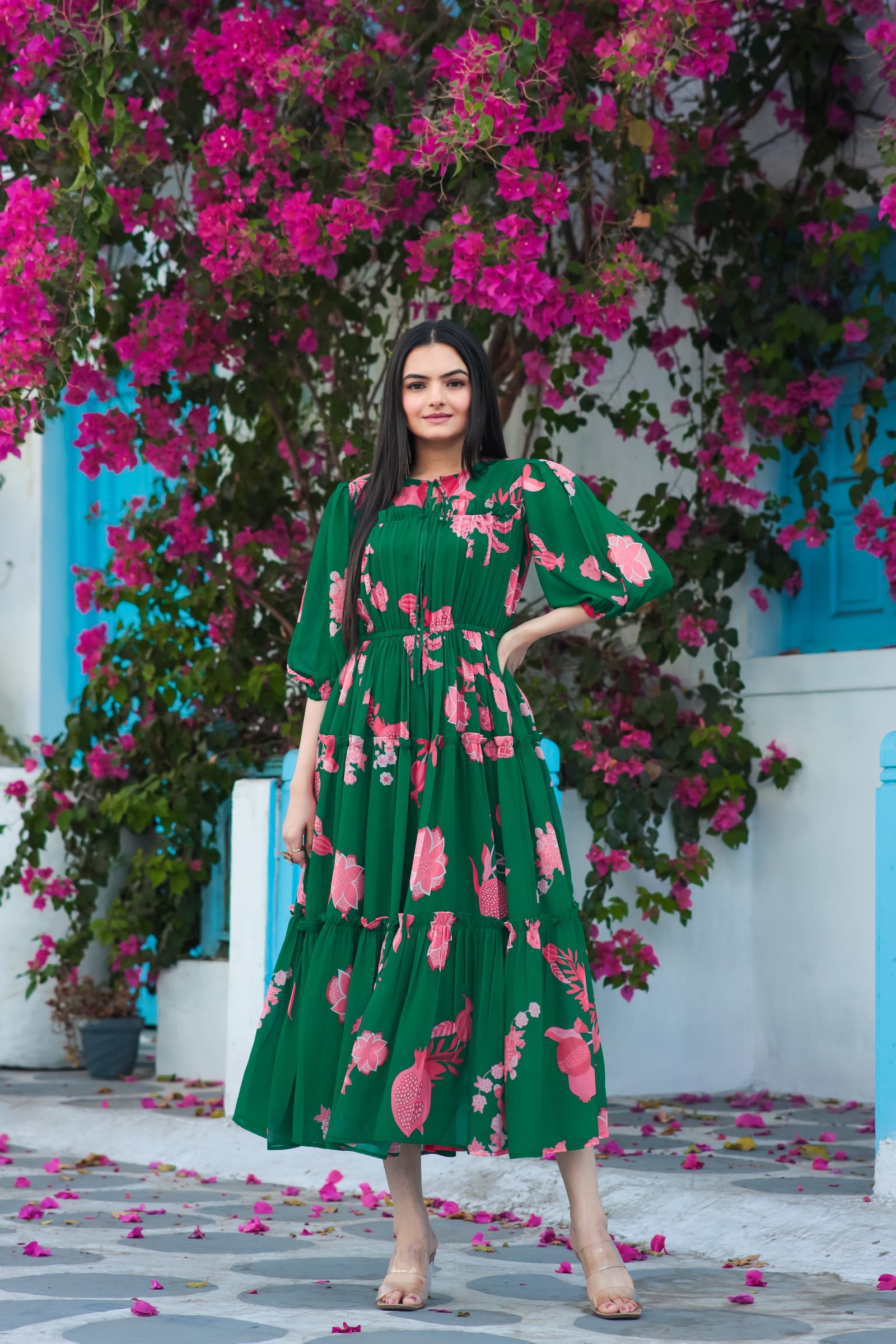 Model wearing Spruce Bruce dark green floral maxi dress by Masakali
